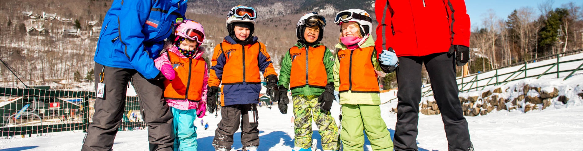 young children in ski lesson